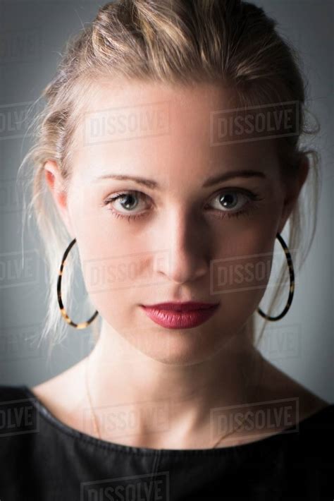 Young Woman Wearing Hoop Earrings Portrait Stock Photo Dissolve