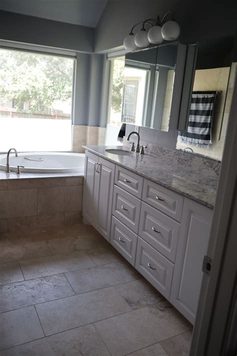 Ivory travertine tile bathroom in 4 x 4 tumbled tiles. Savona Ivory Brushed Travertine Floor | Master bath ...