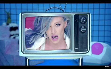 11 best hilary duff s alternate sparks music video moments because it s a neon dance party we