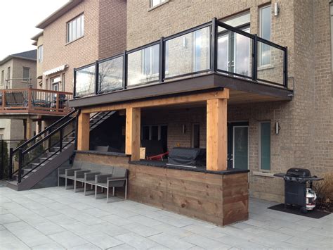 This huge guide has 243 different deck railing ideas and designs to use for your porch, deck or patio. deck-glass-railing-ideas-thornhill - GTA RAILINGS