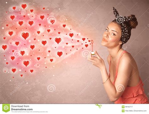 Pretty Young Girl Blowing Red Heart Symbols Stock Image Image Of Blow