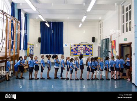 School Children Line Up After Pe Class Stock Photo Alamy