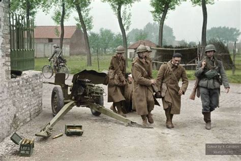 French Troops Carrying A Wound Comrade During The Battle Of France May