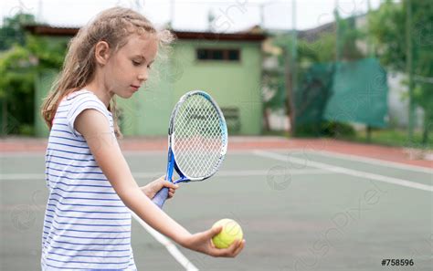 Pretty Little Girl Playing Tennis Stock Photo Crushpixel