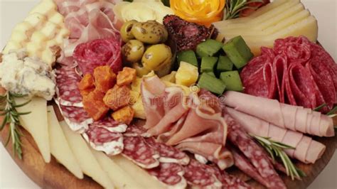 Charcuterie And Cheese Platter Rotates Smoothly Around Its Axis