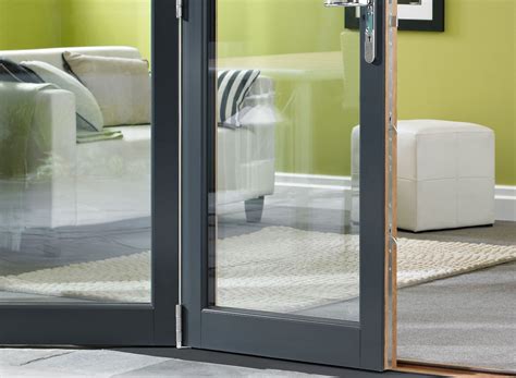 External bifold doors are ideal, make a real design statement and offer great flexibility. Ultra 2.4m (approx 8ft) Grey Aluminium & Oak - Triple ...