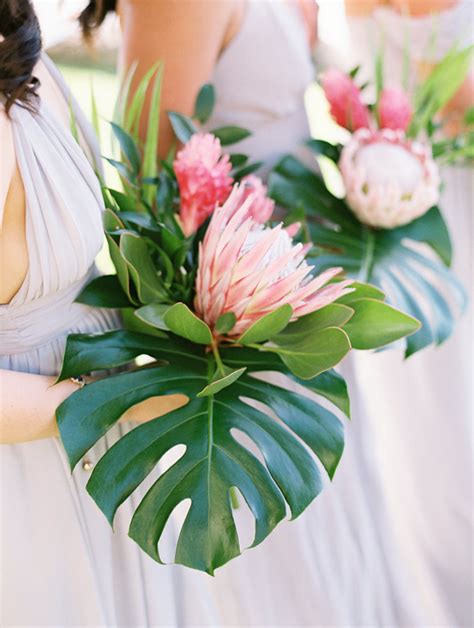 Bridesmaid Bouquets With King Protea Ginger And Monstera Leaf Tropical