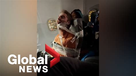 Unruly Passenger Duct Taped To Seat After Allegedly Assaulting Flight Attendants Youtube