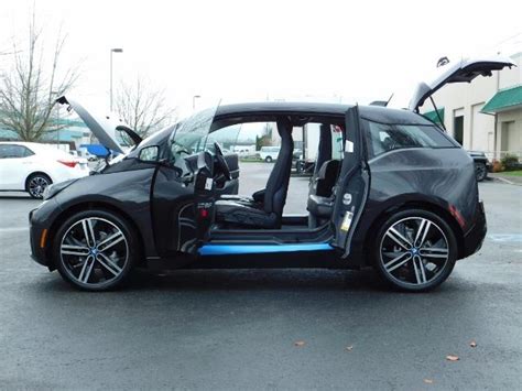 Accelerate into summer with a 1.5%†† rate reduction. 2014 BMW i3 TERA WORLD / NAVi / Self Park / Leather / LOADED