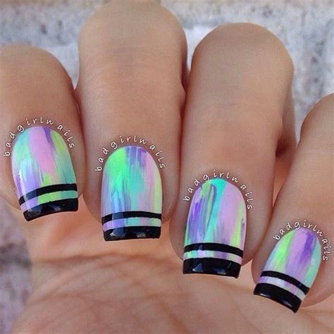 Coat Your Nails In Multi Color And Add Black Metallic Strips For The