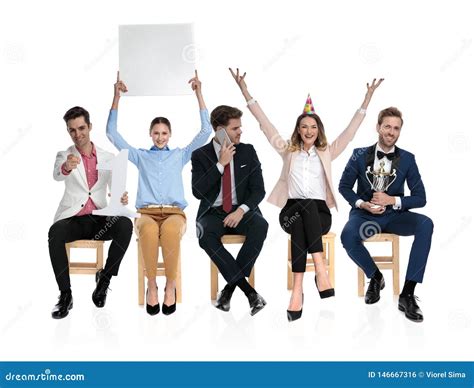 Team Of Seated Young People Having Fun Together Stock Photo Image Of