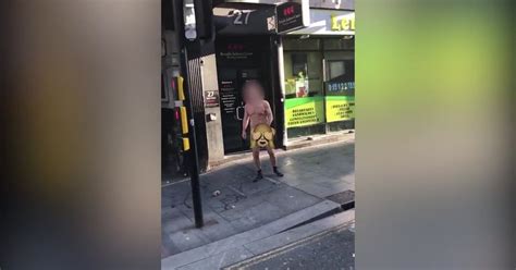 Naked Man Filmed Walking Down High Street Wearing Nothing But Socks And