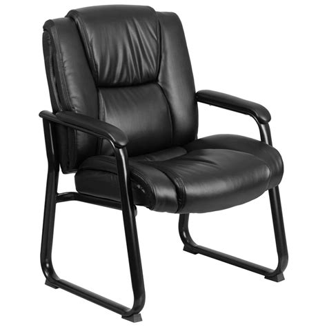 Portrait of beautiful female manager sitting in big leather chair at office. 500 lb. Capacity Big & Tall Black Extra Padded Leather ...