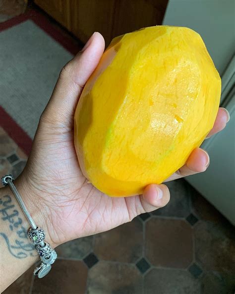 This Is How My Friend Eats Her Mango After Peeling Of The Skin