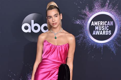 Dua Lipa Sneakily Reveals Second Album Title With New Arm Tattoo See