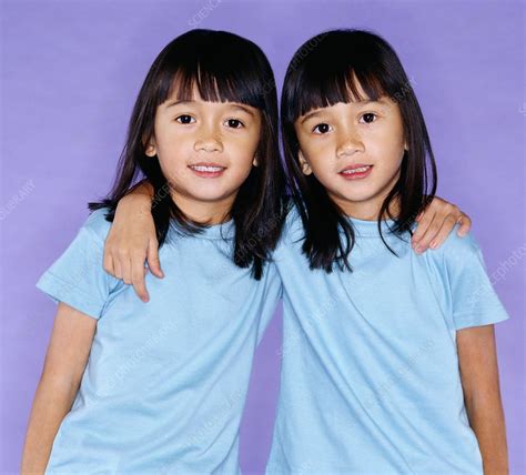Identical Twin Sisters Stock Image P900 0103 Science Photo Library