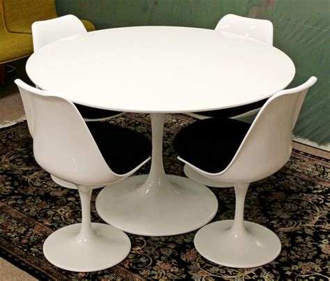Eero saarinen tulip table modern dining room interior home dining room design home decor an undeniable classic, this simple, sweeping table looks as good today as it did in 1956.designed for knoll bentwood chairs tulip dining table interior home deco dining room design home decor. Mid-Century Modern Burke Tulip Dining Table 4 Chairs Set ...