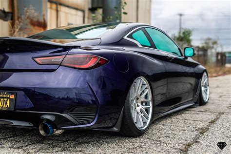 Stanced Infiniti Q Goes Racy With Custom Ground Effects And Ducktail