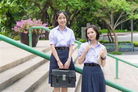 Cute Asian Thai High Schoolgirls Student Couple In School Uniform Stock