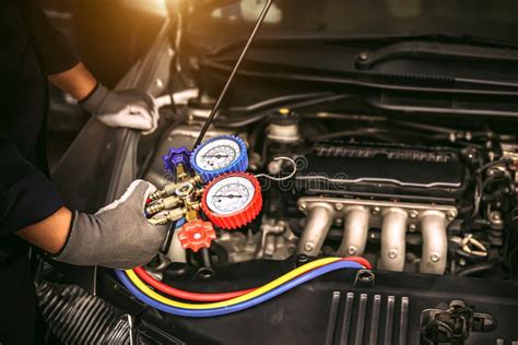 Car Care Maintenance And Servicing Hand Technician Auto Mechanic Using