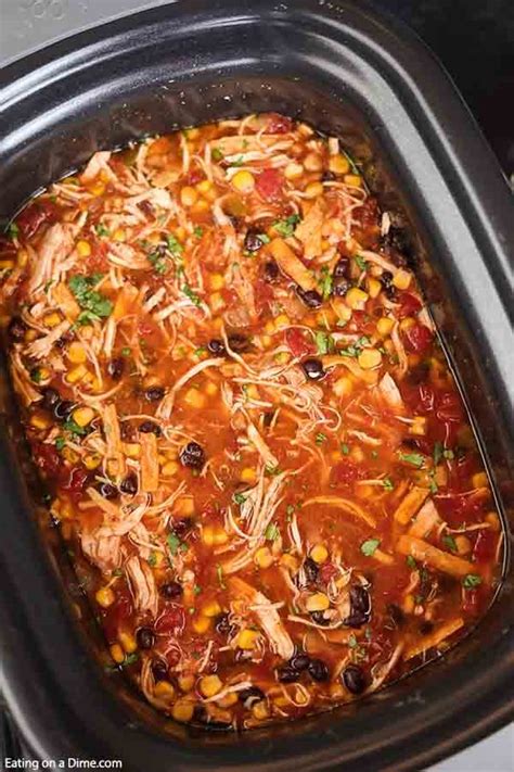 Topped with cheese and crispy tortilla strips for an appetizing dish! Crockpot chicken tortilla soup recipe - Easy and Budget ...