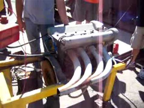 A double overhead camshaft (also called double overhead cam, dual overhead cam or twincam) valvetrain layout is characterized by two camshafts being located within the cylinder head, where there are separate camshafts for inlet and exhaust valves. Dual Overhead Cam Model T Ford engine - YouTube