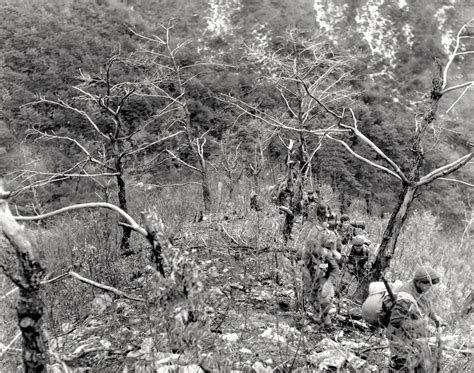 Historic Korean War Photo Advancing Over Napalm Scorched Hills