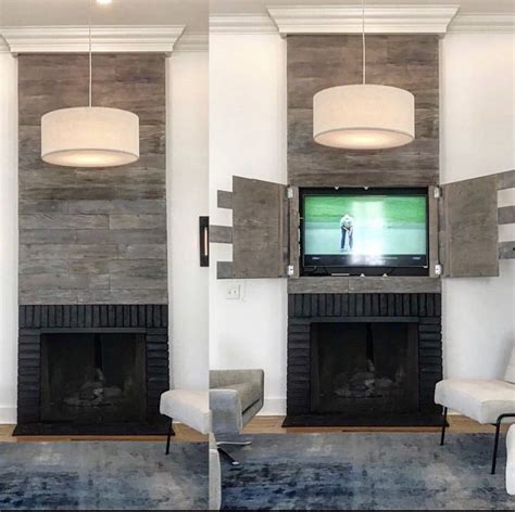 Hidden Tv Console Over The Fireplace By Heirloom Design Build Paneling