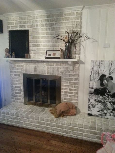Whitewash allows the texture of the brick to show through, while covering most of its red color. $20 Fireplace Makeover: How to get a whitewashed look on a ...