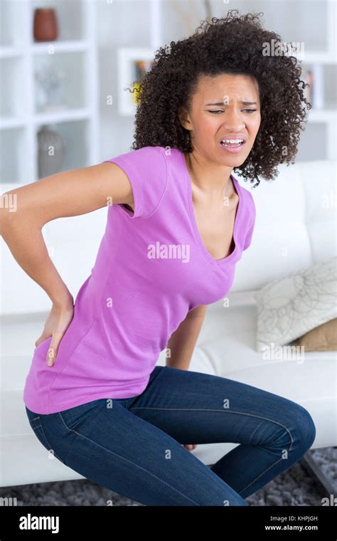 Woman With Severe Lower Back Pain Stock Photo Alamy