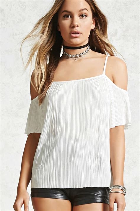 A Woven Open Shoulder Top With Cami Straps Short Sleeves And Allover