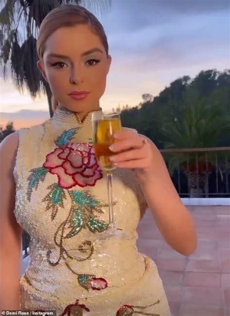 Demi Rose Toasts The New Year With A Glass Of Bubbly As She Showcases Her Enviable Curves