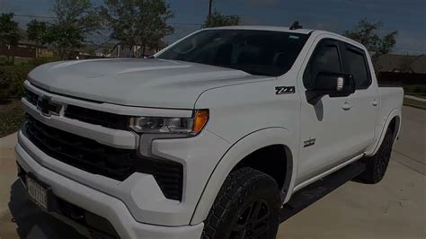 2022 Refreshed Chevy Silverado Rst Blacked Out And Lifted On 35 Nitto