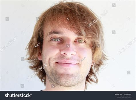 Young Man Green Eyes Smiling Candid Stock Photo Edit Now 2106982331