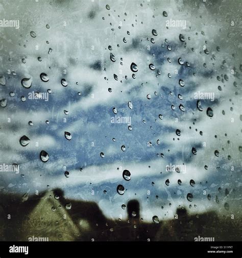 Stormy Skies And Raindrops On The Window Stock Photo Alamy