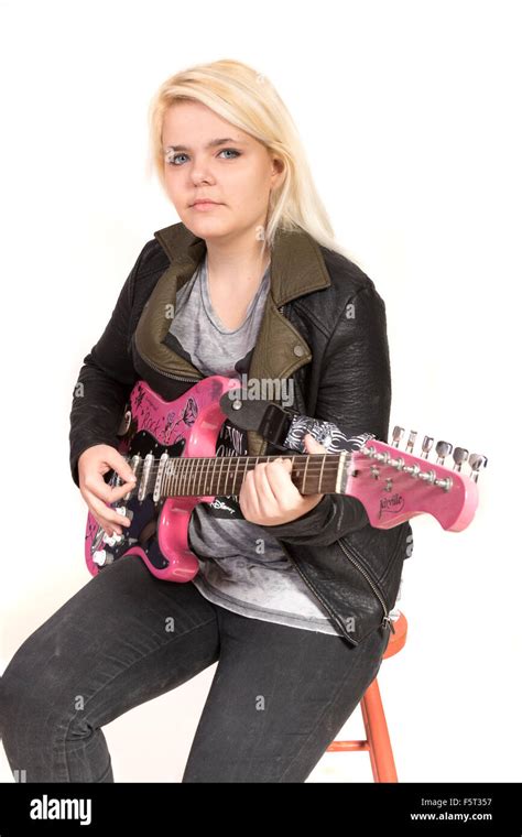 Teenage Girl Playing Electric Guitar Stock Photo Alamy