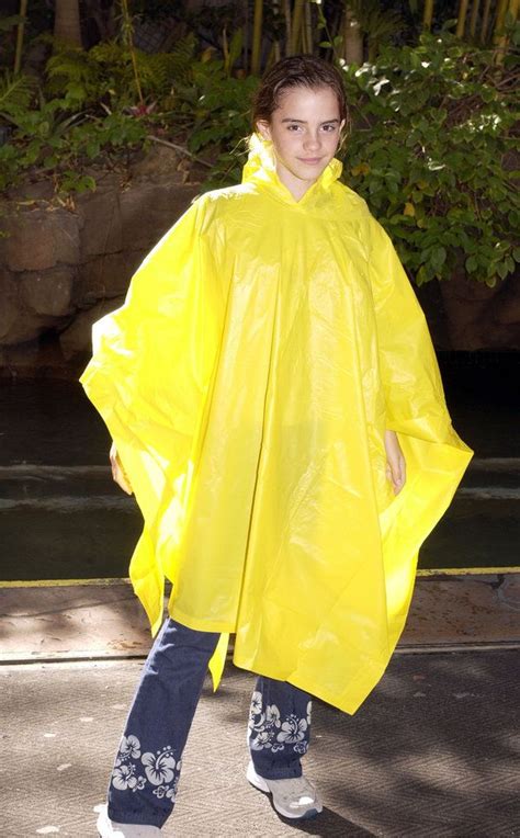 A Woman Wearing A Yellow Rain Poncher