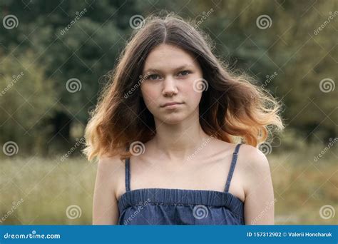 Portrait Of Beautiful Teenager Girl 15 Years Old With Brown Flying