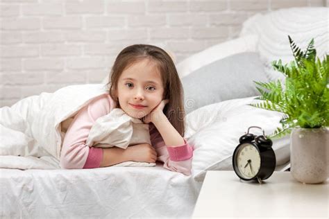 Cute Little Child Girl Wakes Up From Sleep Stock Image Image Of Home