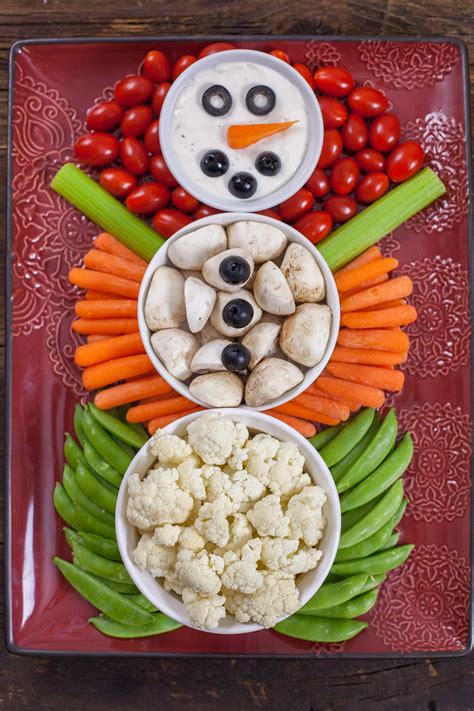 Christmas Veggie Tray Snowman Eating Richly