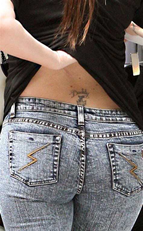 Khloé Kardashian Getting Tramp Stamp Tattoo Removed Watch Tramp Stamp Tattoos Khloe