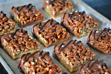 They're simple to make, using ingredients i typically already and tbh, chocolate and pecan pie is just a match made in heaven! Pecan Pie Bars Dipped in Milk Chocolate & Drizzled with ...