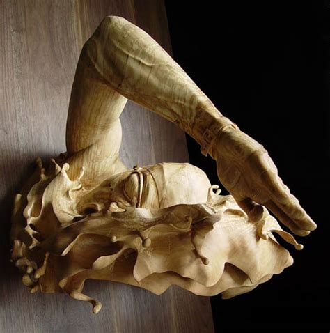 The la luz sculpture is made out of 4 layers of reclaimed redwood, glued, carved to highlight the beautiful grain and finished with linseed oil. The Swimmer: Stunning Wood Sculpture Carved From a Single ...