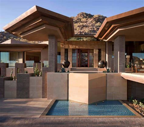 Modern Desert Home Set On A Rocky Hillside With Spectacular City Views