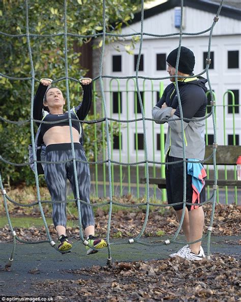 Kym Marsh Flashes Her Abs As She Completes Set Of Pull Ups In The Park Daily Mail Online