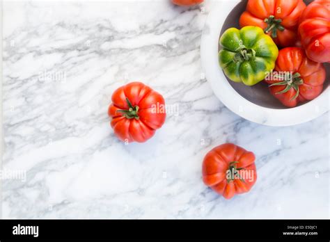 Marinda Tomatoes In Bol On Marble Plate Stock Photo Alamy