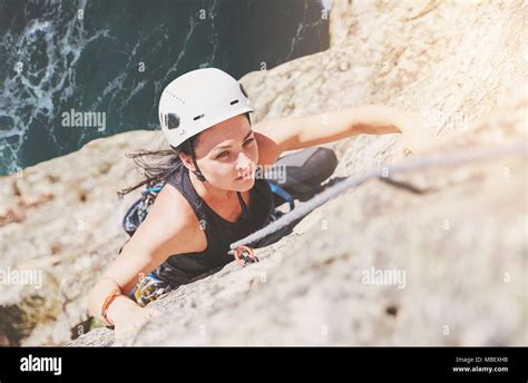 Focused Determined Female Rock Climber Scaling Rock Stock Photo Alamy