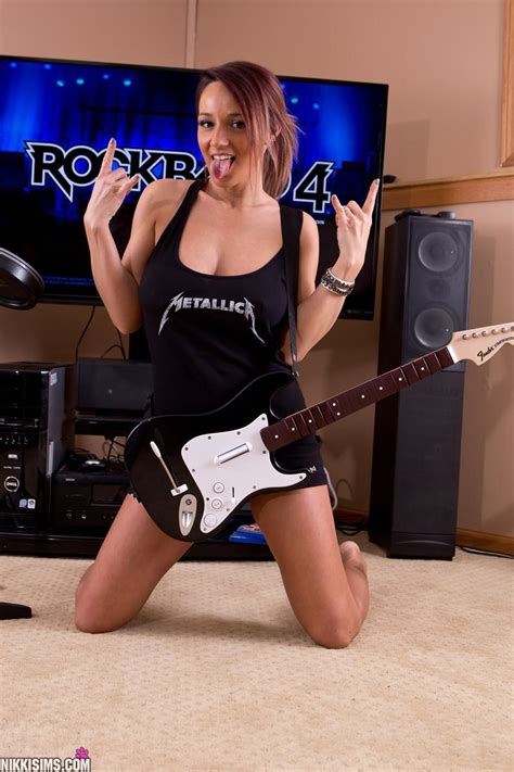 busty babe nikki sims gets turned on playing rock band porn pictures xxx photos sex images