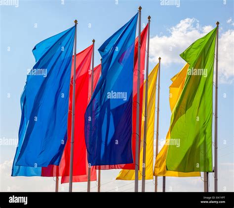Colorful Flags Waving On Blue Sky Background Stock Photo Alamy