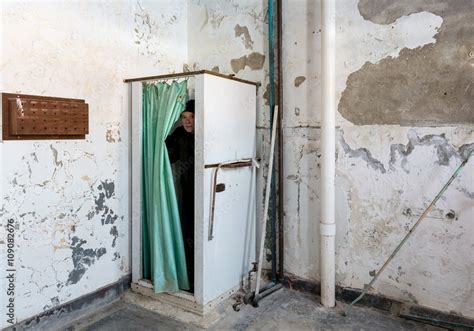 Abandoned Shower And Man Inside Trans Allegheny Lunatic Asylum Photos